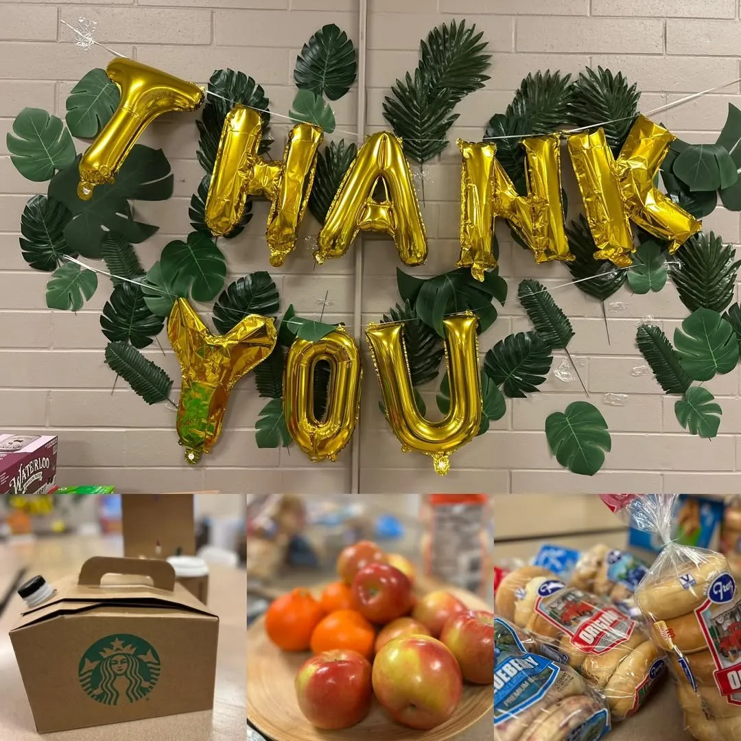 A staff appreciation table with gold THANK YOU balloons and treats